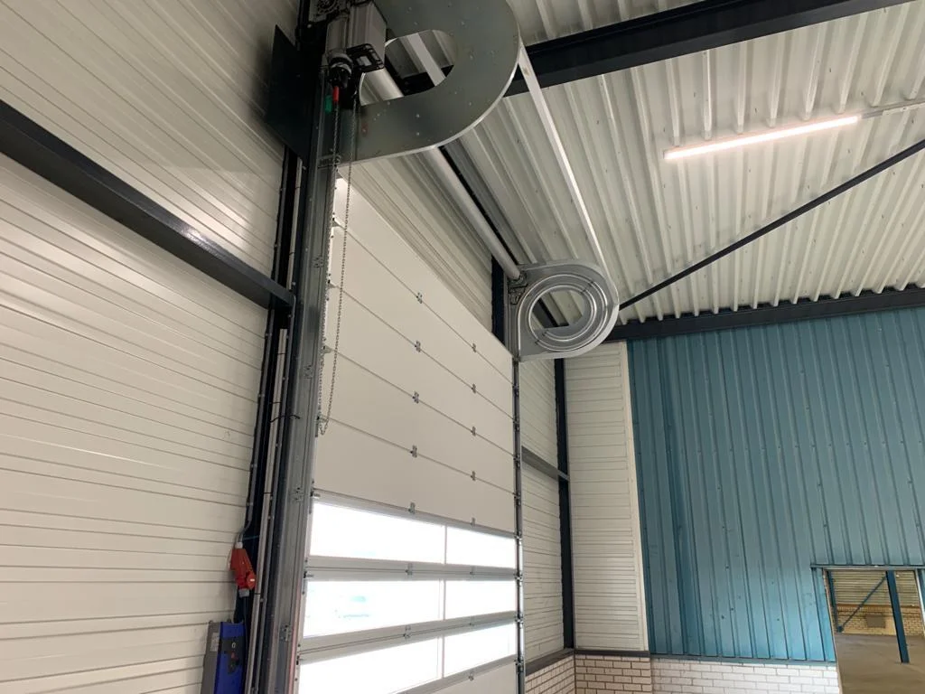 Van Heemskerk Rijssen Vervangen bedrijfsdeuren renoveren overheadeuren plaatsen loopdeuren schade replace and renovation indusrtrial doors (11)-263b8c55